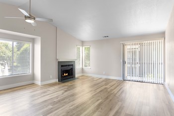 Living Room with Fireplace at Waterfield Square Apartment Homes